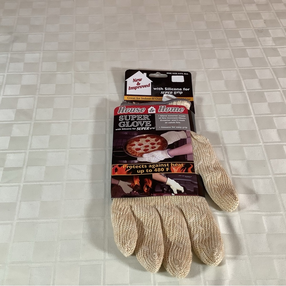 New & improved grill super glove with silicone for grip.. protects against heat